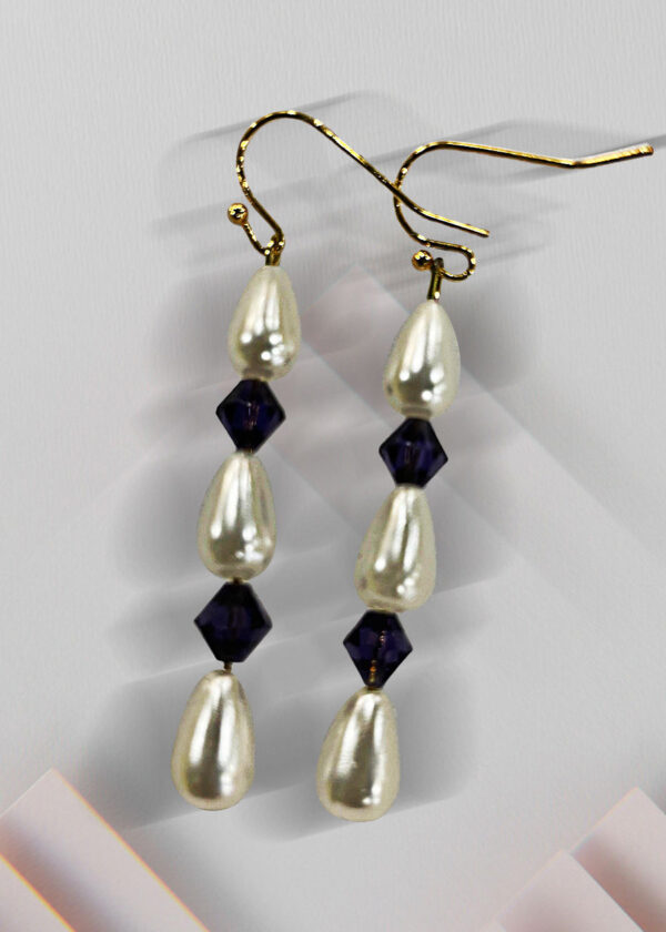 Aretes en perla, púrpura y baño de oro