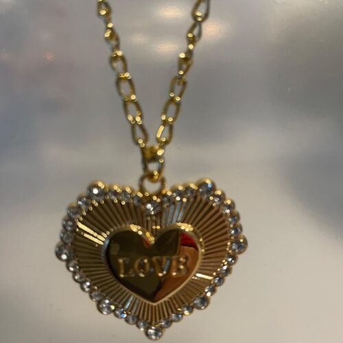 Collar en dorado con dique en corazon