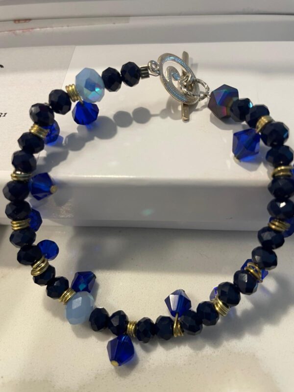 Pulsera en piedra negra y morada
